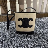 Celine Mini Bucket Tasche aus Textil mit Cuir Triomphe Weiß/Schwarz
