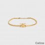 Bracciale articolato Celine Triomphe in ottone dorato