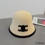 Sombrero de pescador Celine Triomphe en beige rafia/negro